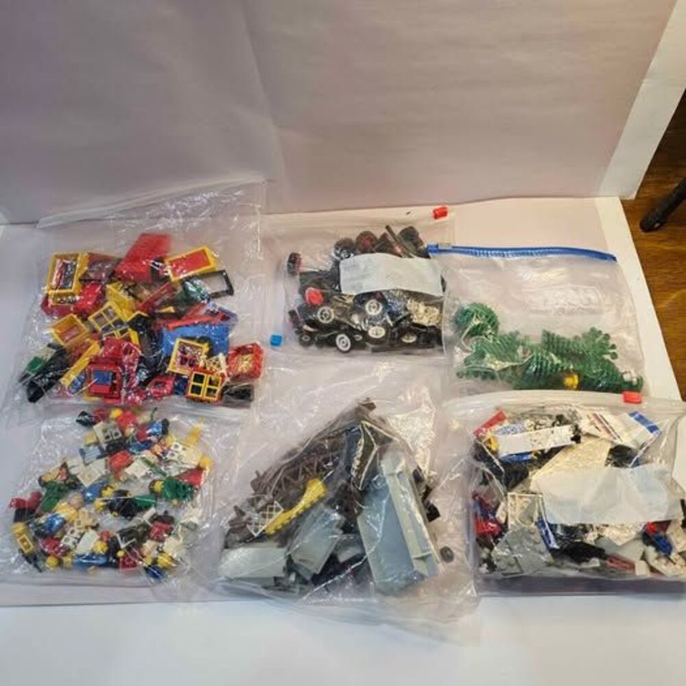 Vintage LEGO Mixed Bulk Lot with Minifigures, wheels, bridge parts & more